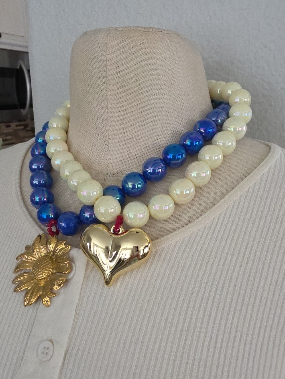 Cream and Blue Beaded Necklace with Gold Heart Pendant